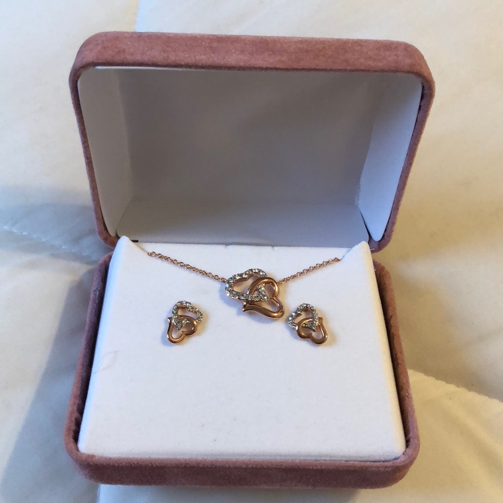 Rose gold heart shaped necklace and earrings